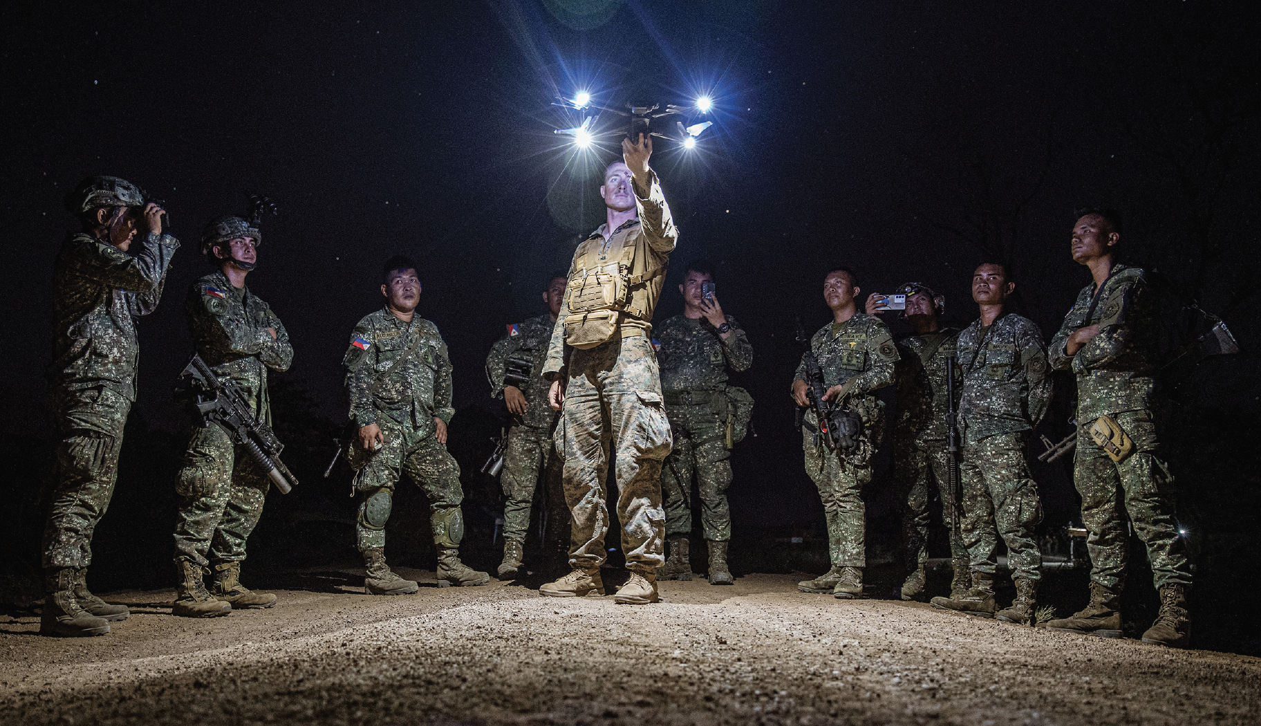 U.S. Marine Corps Corporal Joshua Henneberg, rifleman assigned to Alpha Company, Battalion Landing Team 1/5, 15th Marine Expeditionary Unit, prepares to launch Skydio X2D small unmanned aerial system during integrated training alongside Philippine marines during exercise Balikatan 24 on Balabac Island, Philippines, April 26, 2024 (U.S. Marine Corps/Peyton Kahle)